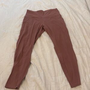 Lululemon dusty rose leggings size 12. In perfect condition - no piling.